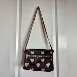 Lesportsac Black Crossbody Bag with Pink Heart Print